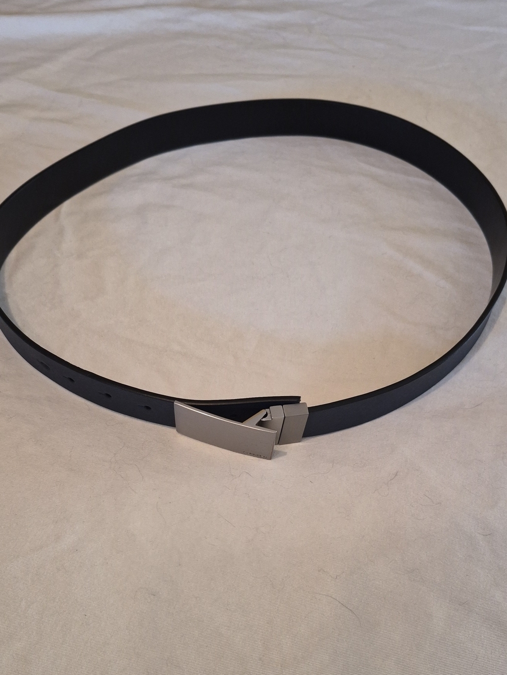 Calvin Klein Black Strap Belt with Brushed Silver Buckle